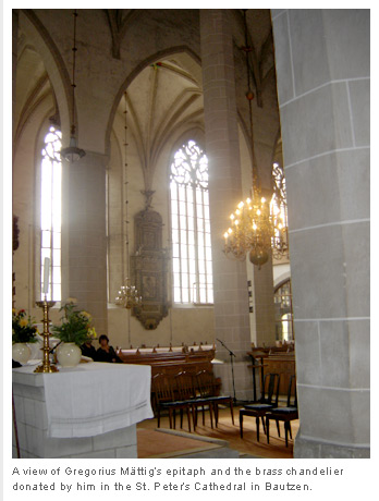 A view of Gregorius Mttigs epitaph and the brass chandelier donated by him in the St. Peters Cathedral in Bautzen.